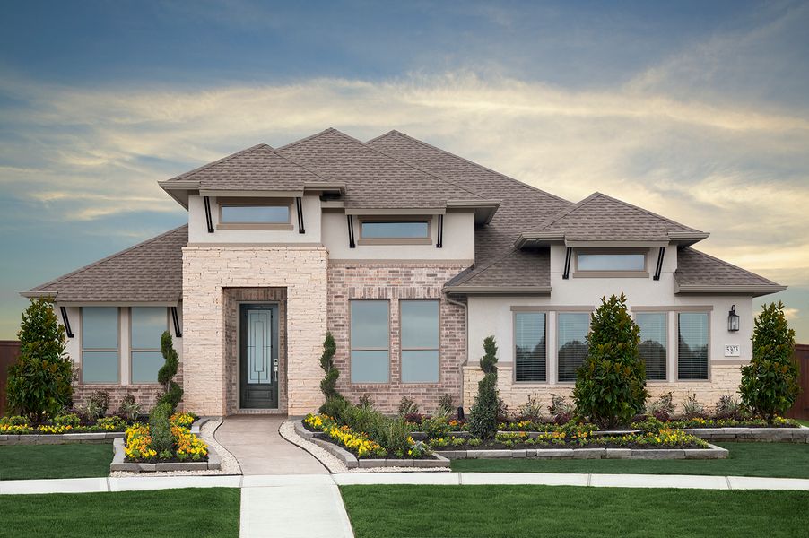 Front exterior of a home in the Meridiana 60' community, located in Manvel, TX (Image 14).