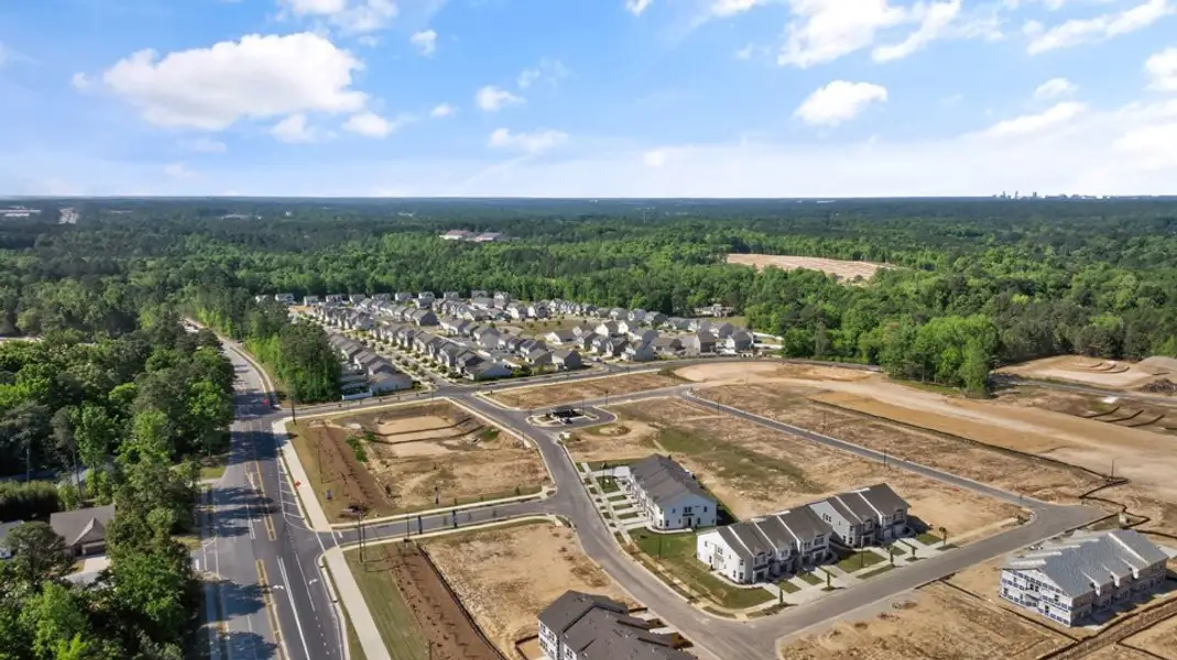 Aerial view of the Chapel Townes community in Raleigh, NC, showing layout and nearby surroundings (Image 1). Aerial view of the Chapel Townes community in Raleigh, NC, showing layout and nearby surroundings (Image 1).