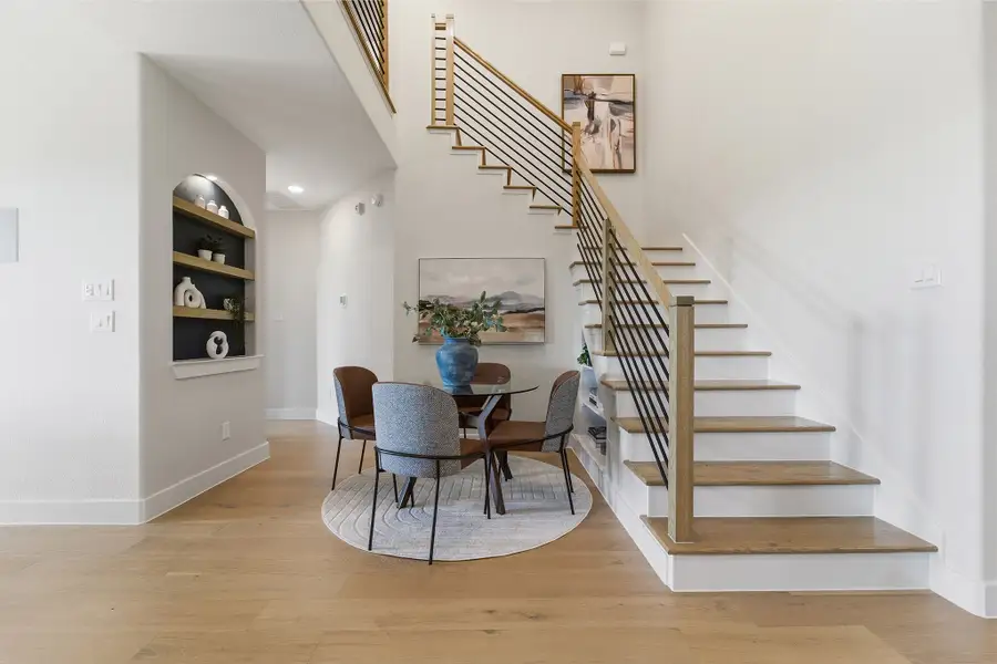 Furnished interior in a model home at Wildrye in Waller (Image 35).