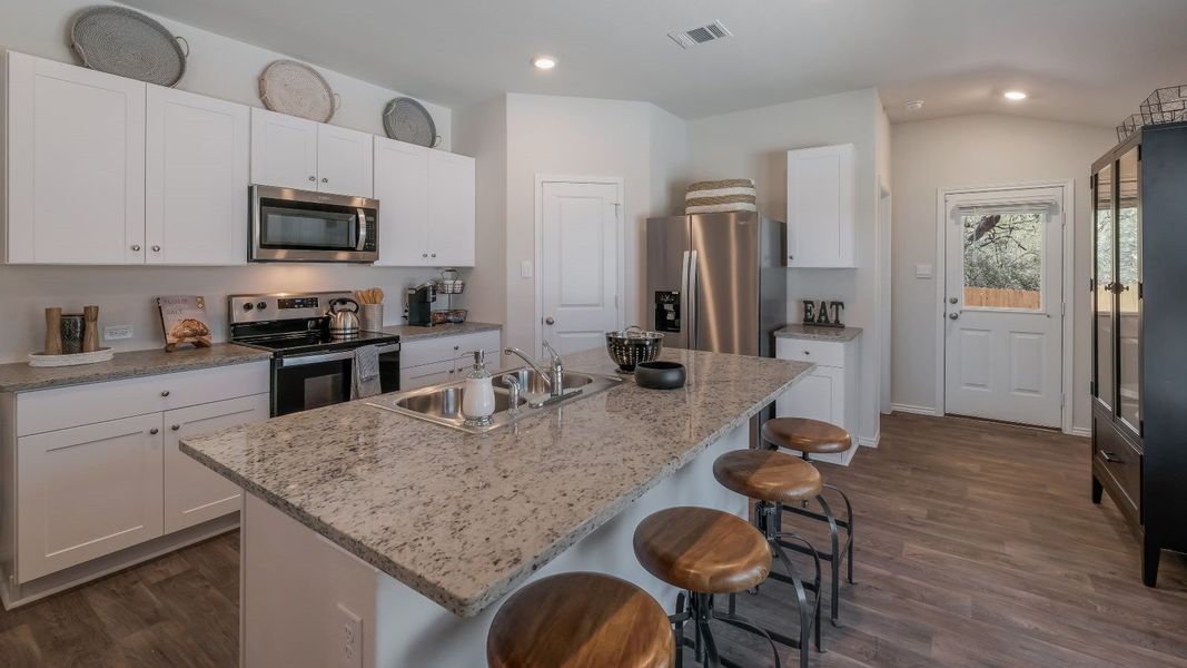 Furnished interior in a model home at August Trails in Needville (Image 9). Furnished interior in a model home at August Trails in Needville (Image 9).
