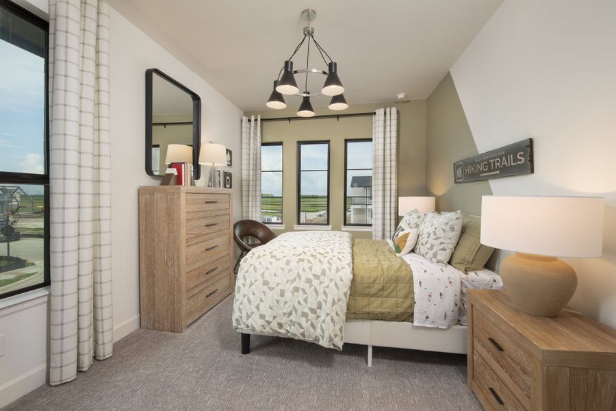 Furnished interior in a model home at Austin Point 60' in Richmond (Image 17).