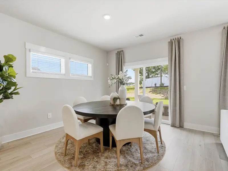 Furnished interior in a model home at Crossing at Abner Creek in Greer (Image 5).