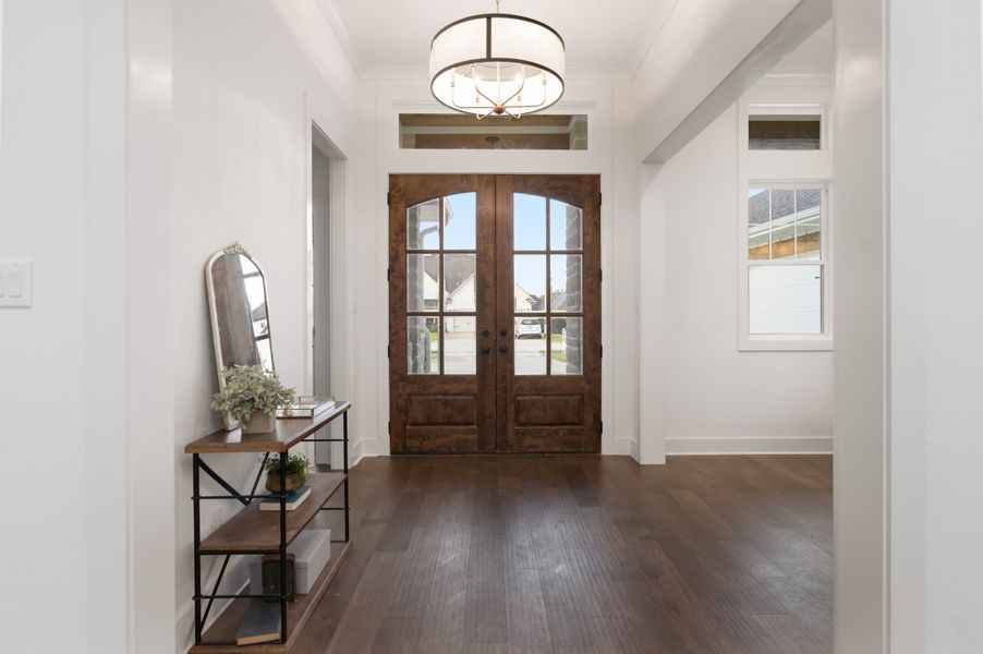 Furnished interior in a model home at Pebble Creek in College Station (Image 21). Furnished interior in a model home at Pebble Creek in College Station (Image 21).