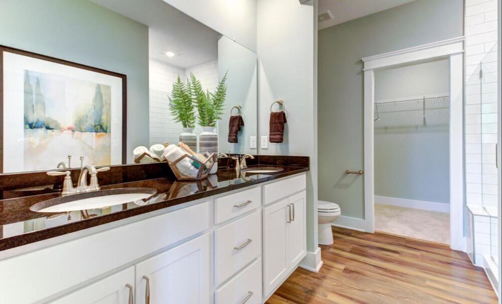 Furnished interior in a model home at CraigStone in Woodruff (Image 15).