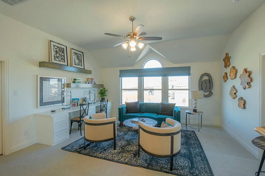 Furnished interior in a model home at Woodcreek in Fate (Image 26).