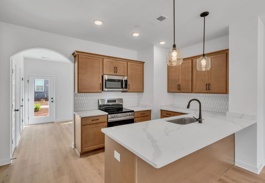 Furnished interior in a model home at Oxford Station in Gallatin (Image 50).
