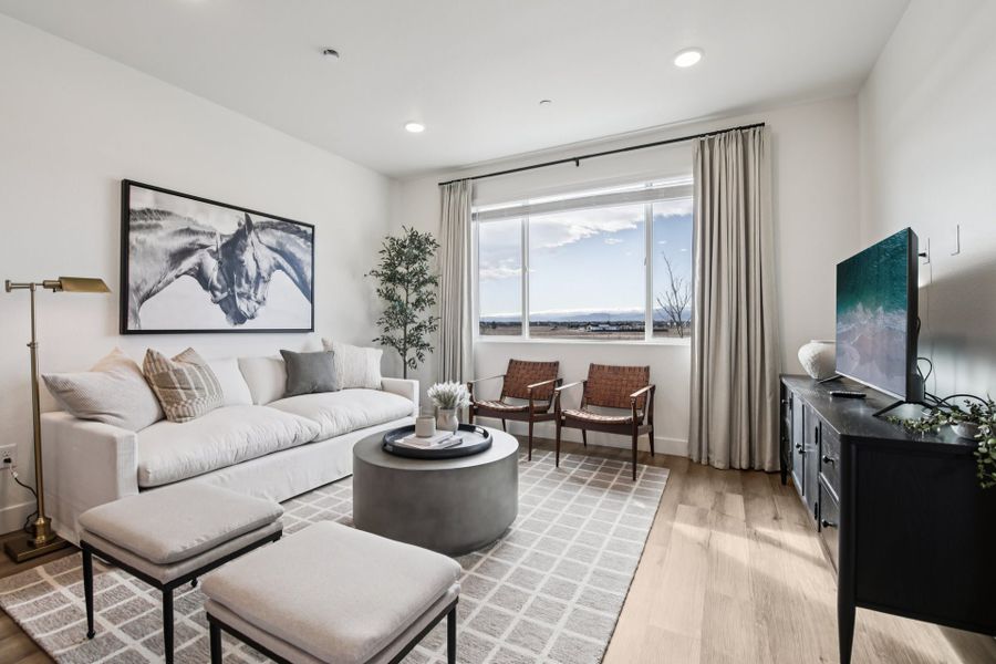 Furnished interior in a model home at Timnath Ranch Townhomes in Timnath (Image 19).