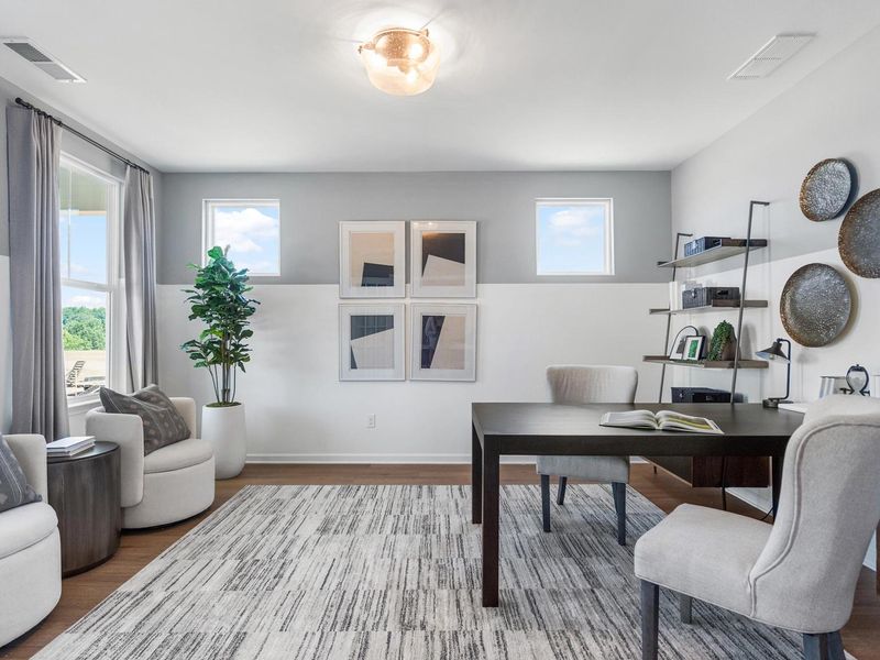 Furnished interior in a model home at Wehunt Meadows in Hoschton (Image 4).