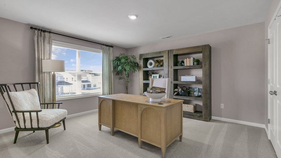 Furnished interior in a model home at Eagle Creek in Fuquay Varina (Image 7).