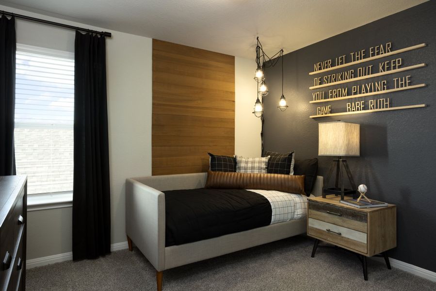 Furnished interior in a model home at Waterstone Crossing in Kyle (Image 32).