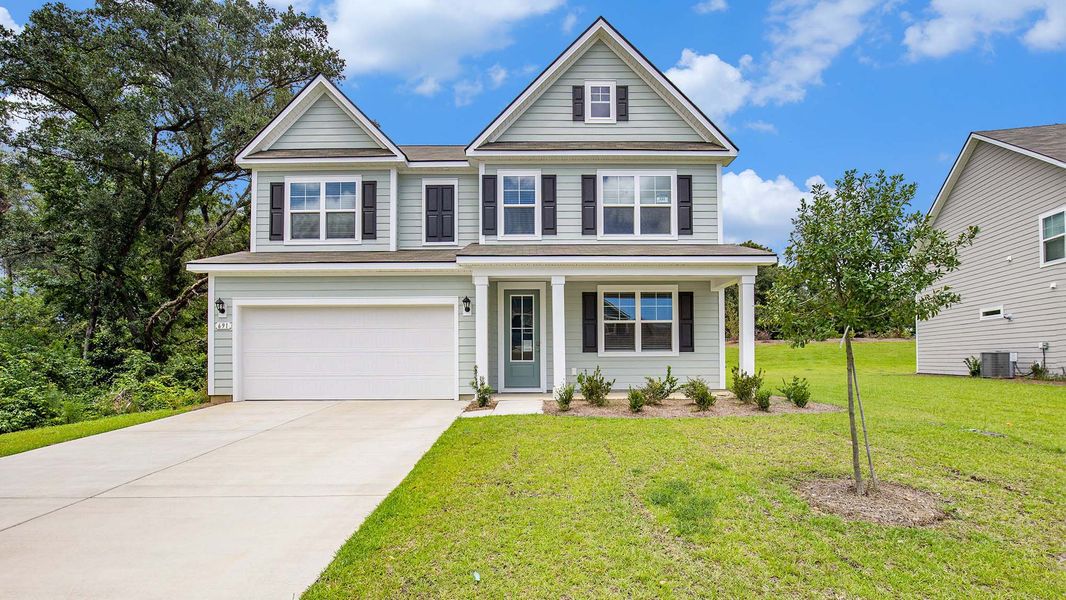 Front exterior of a home in the Heron Pointe community, located in Myrtle Beach, SC (Image 9).