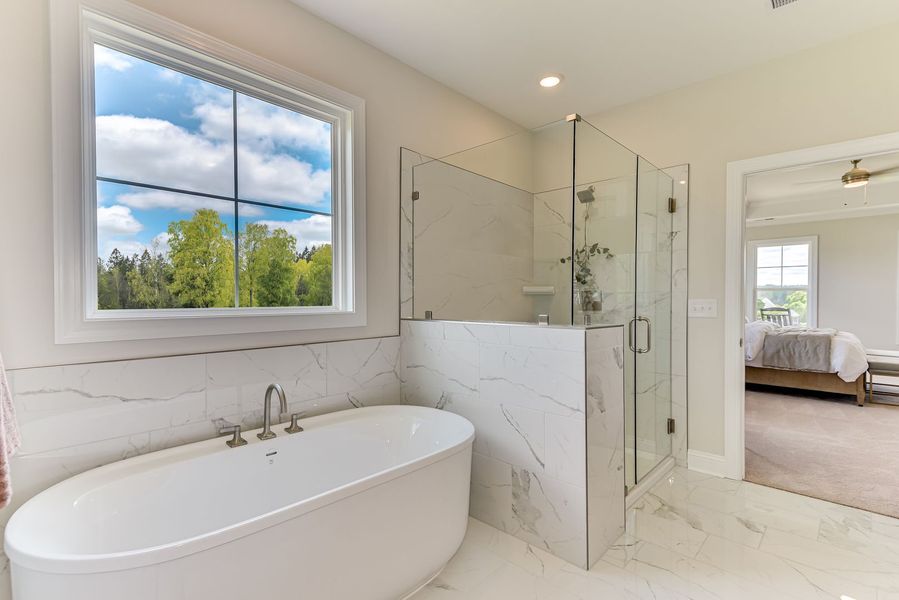 Primary bath with a spacious, spa-like feel Primary bath with a spacious, spa-like feel