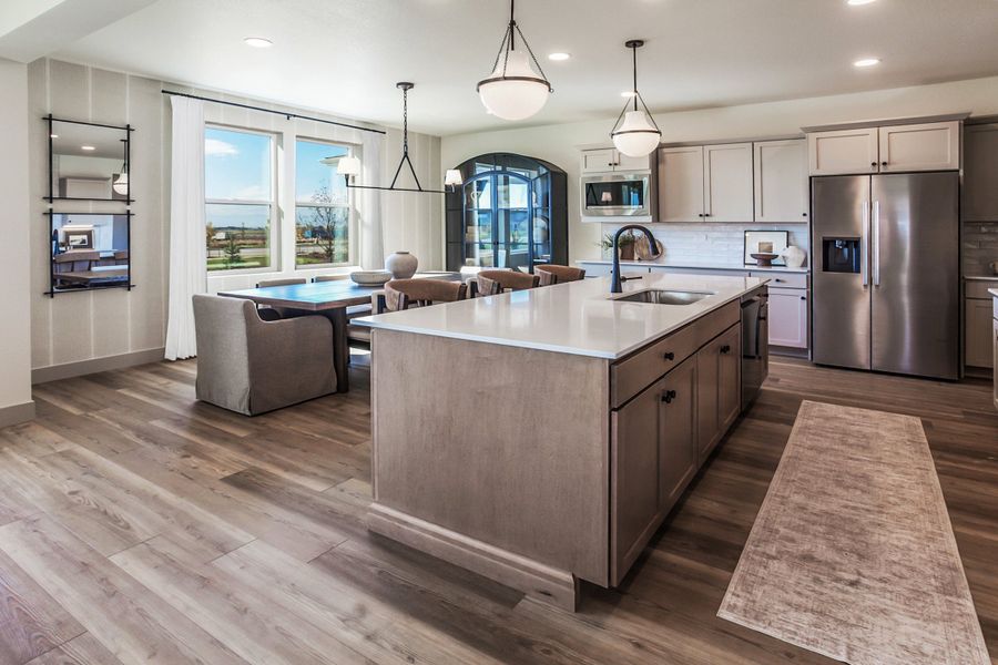 Furnished interior in a model home at Prairie Song in Windsor (Image 7).