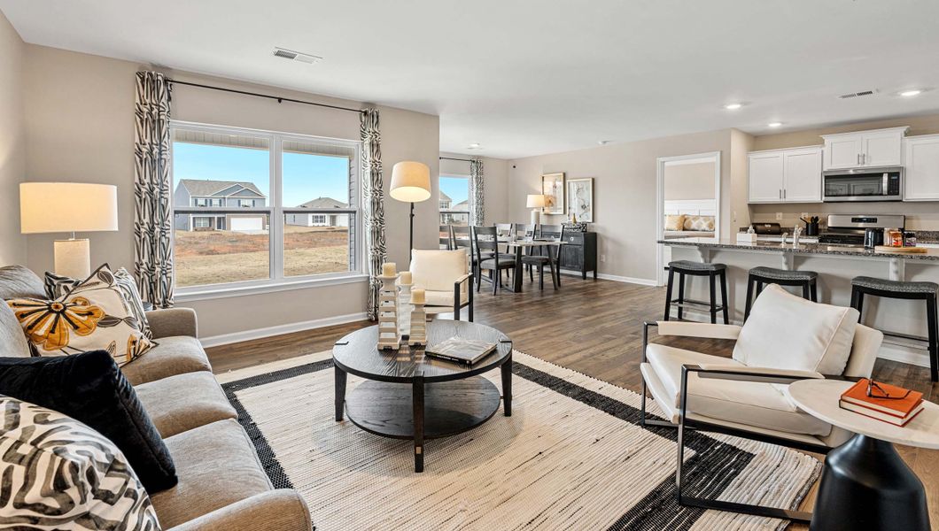 Furnished interior in a model home at Lightwood Cottages in Moore (Image 21).