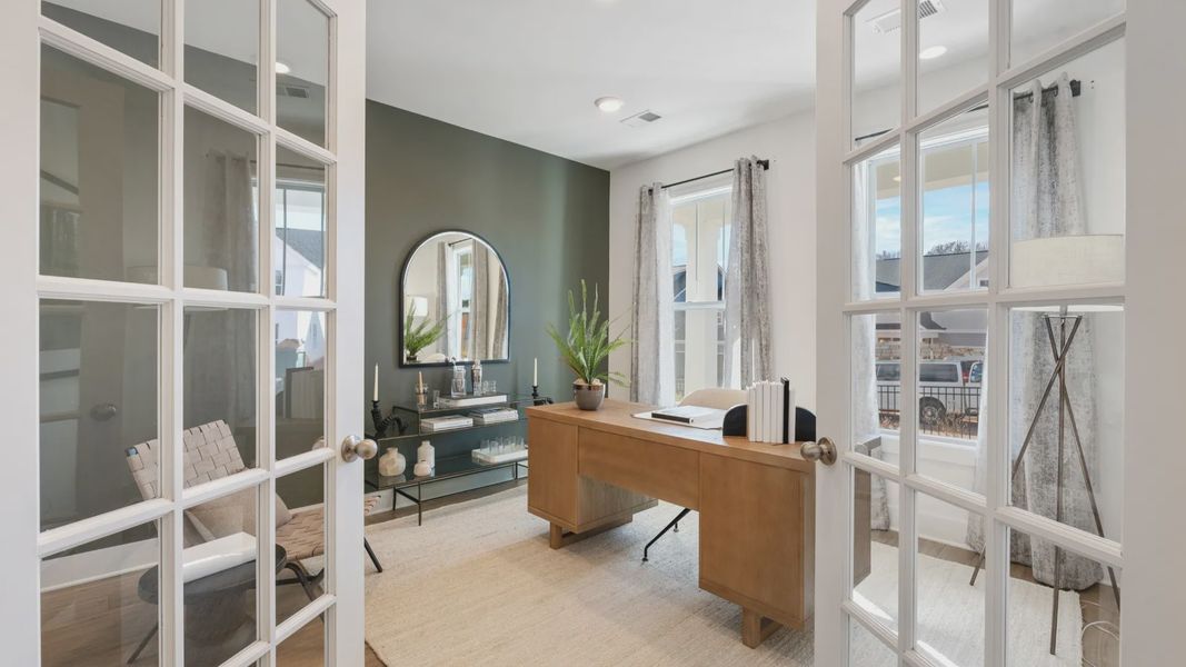 Study space with french doors, large windows, and hardwood flooring add a touch of luxury to the space at Magnolia Park Study space with french doors, large windows, and hardwood flooring add a touch of luxury to the space at Magnolia Park