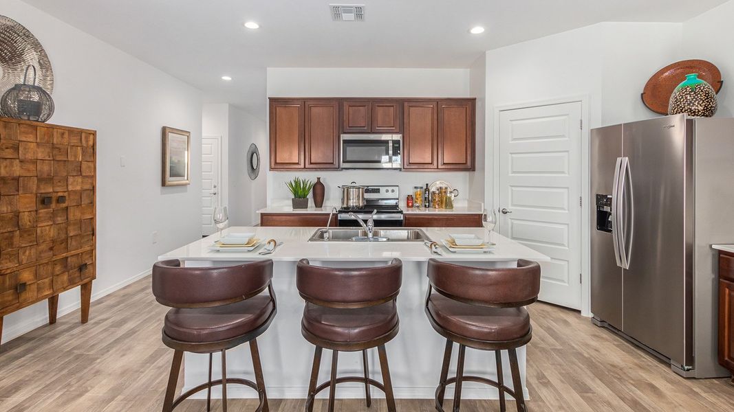 Furnished interior in a model home at Roadrunner Estates in Tucson (Image 18).