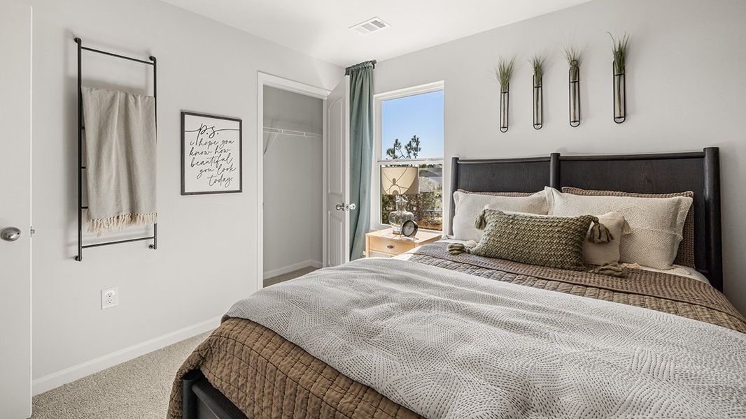 Furnished interior in a model home at Harvest Park in Decatur (Image 11).