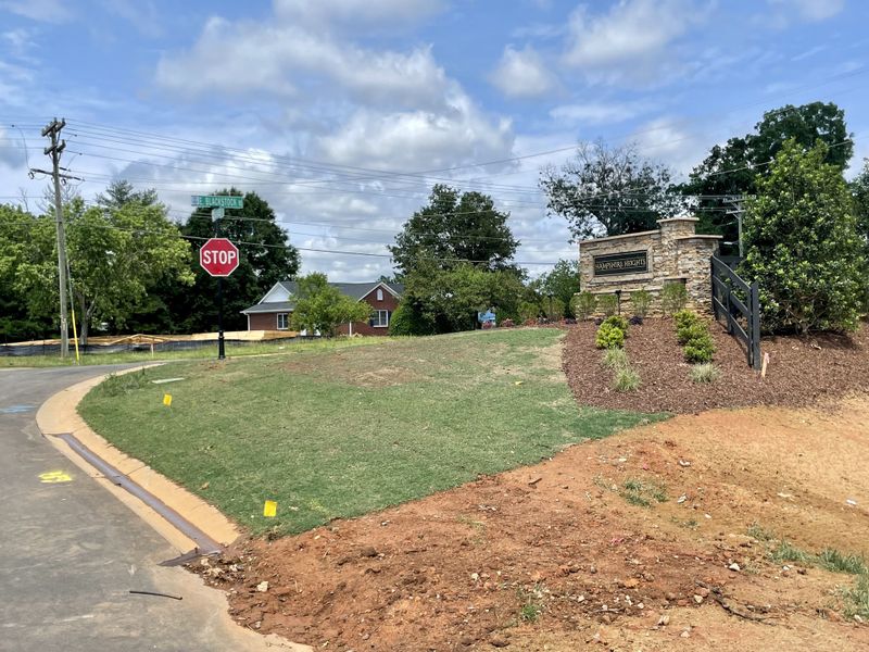 Entrance to the Hampshire Heights community in Moore, SC, featuring signage and landscaping (Image 9). Entrance to the Hampshire Heights community in Moore, SC, featuring signage and landscaping (Image 9).