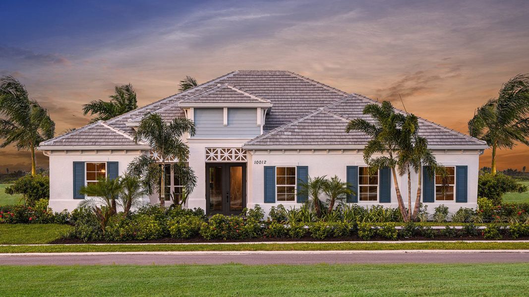 Front exterior of a home in the Grand Park Real Estate and Homes for Sale in Sarasota, FL - Neal Communities community, located in Sarasota, FL (Image 4).