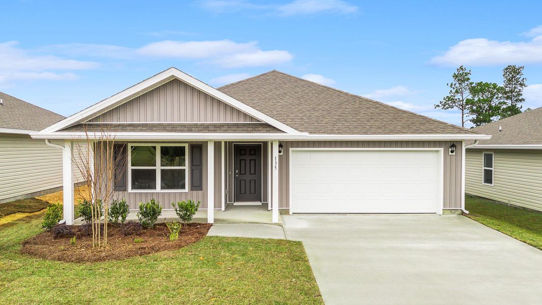 Front exterior of a home in the Magnolia at the Bluffs Phase 3 community, located in Freeport, FL (Image 2).