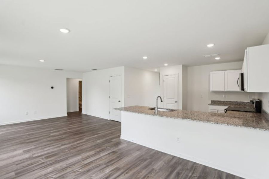 A kitchen with white cabinets. A kitchen with white cabinets.