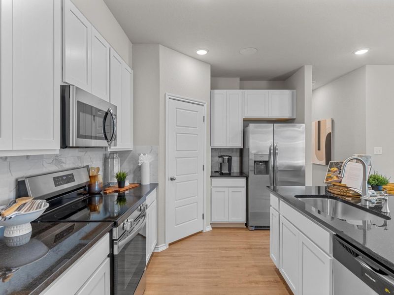 Furnished interior in a model home at Applewhite Meadows in San Antonio (Image 6).