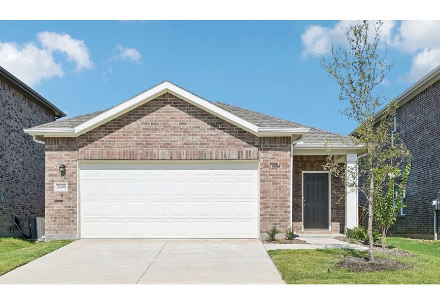 Front exterior of a home in the Stonebrooke community, located in Conroe, TX (Image 10).