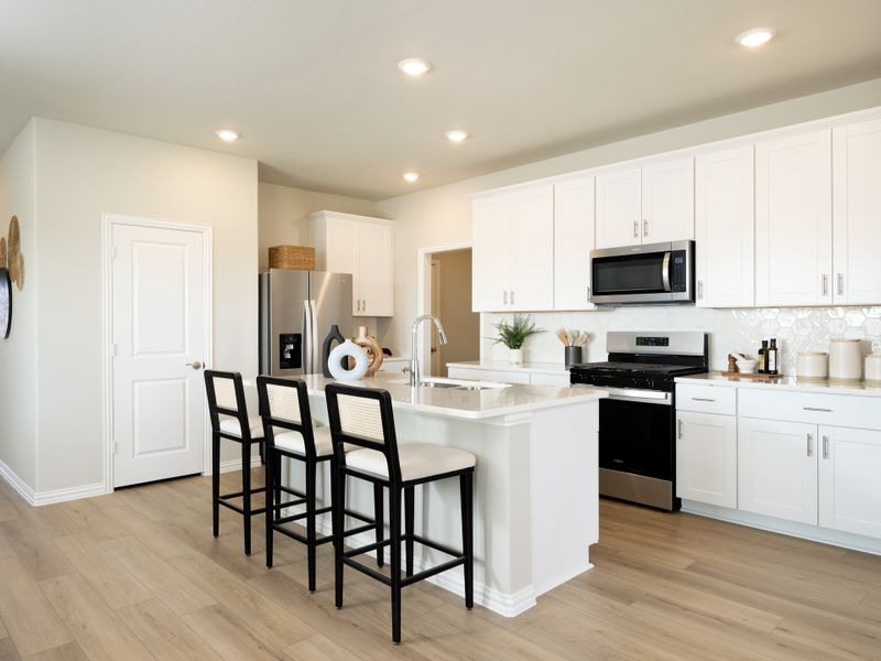 Furnished interior in a model home at Parks at Foster Crossing - Spring Series in Anna (Image 5). Furnished interior in a model home at Parks at Foster Crossing - Spring Series in Anna (Image 5).