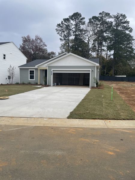 Charming single-story home with a spacious driveway in Essence at Chandler Crossing by Stanley Martin Homes (Summerville, SC).