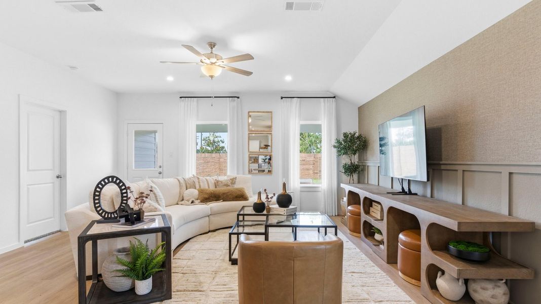 Furnished interior in a model home at Watermark in Alvin (Image 8).