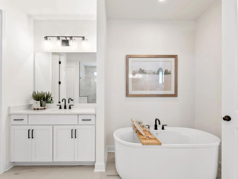 Furnished interior in a model home at Fern Hollow in Buford (Image 6).