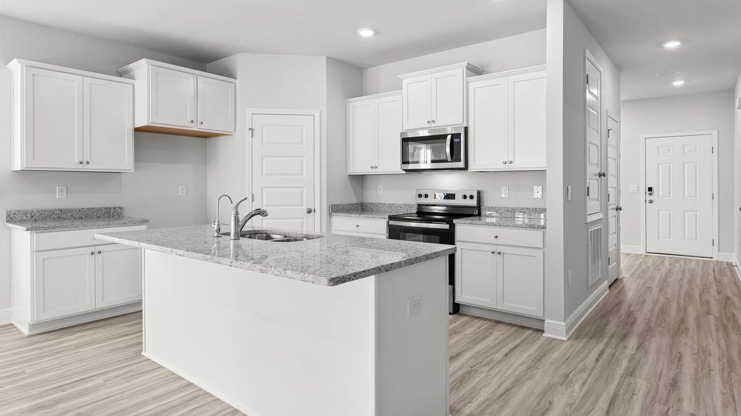 Furnished interior in a model home at Pine Creek and Heron Walk in Port Saint Joe (Image 8). Furnished interior in a model home at Pine Creek and Heron Walk in Port Saint Joe (Image 8).