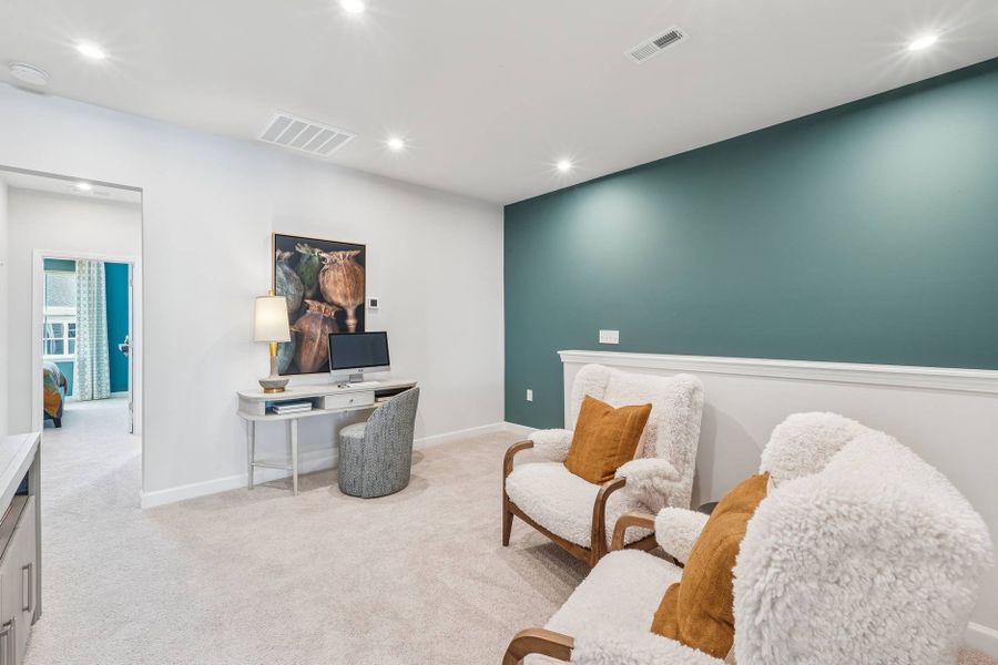 Furnished interior in a model home at Mews at Holding Village in Wake Forest (Image 56).