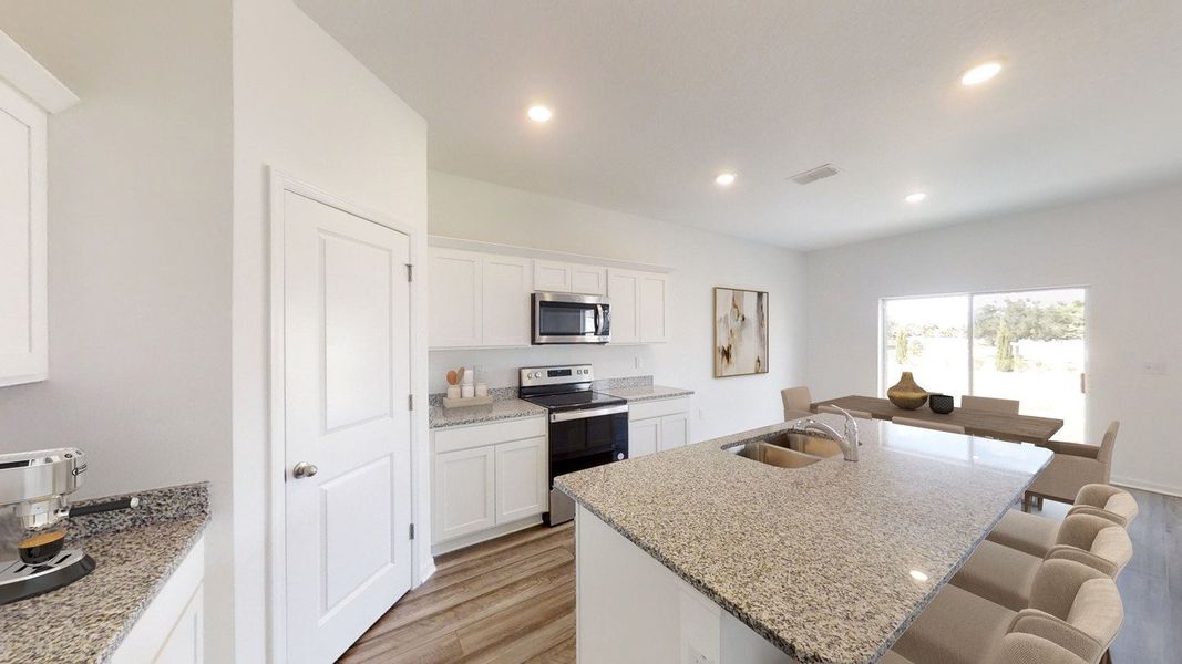 Furnished interior in a model home at Wilson's Walk in Clayton (Image 7).