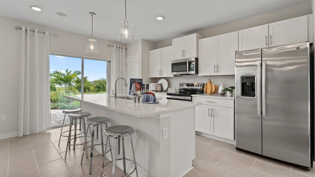 Ponte Vedra Model Kitchen and Island at Willowbrook North by DRB Homes in Winter Haven FL