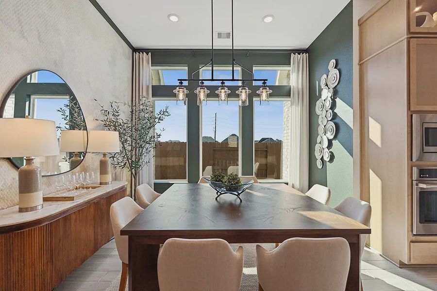 Furnished interior in a model home at Brookewater 60's in Rosenberg (Image 23).