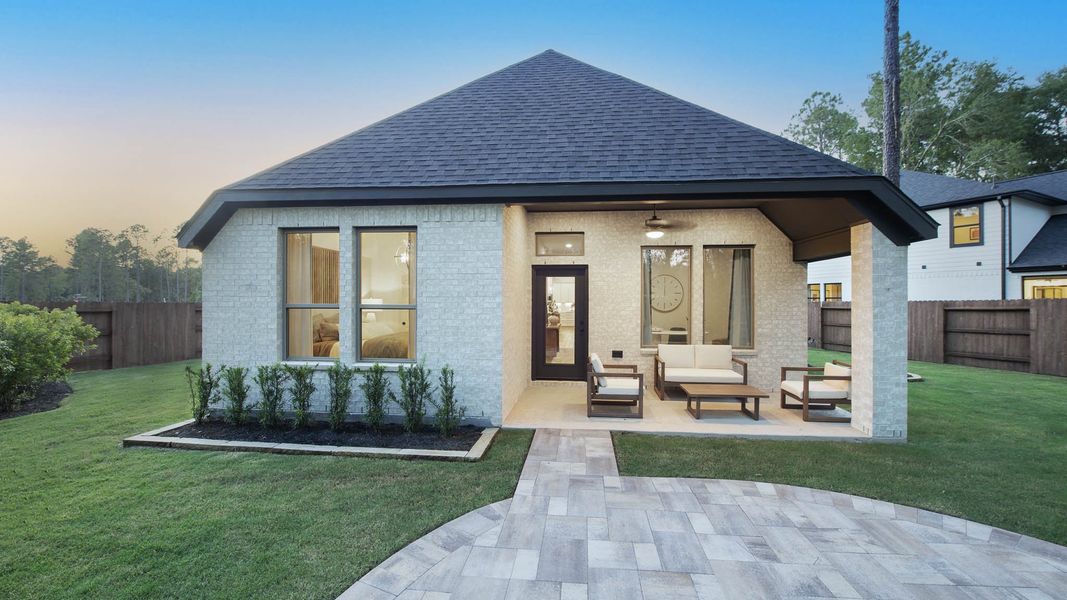 Front exterior of a home in the Woodhavyn 40' community, located in Magnolia, TX (Image 8). Front exterior of a home in the Woodhavyn 40' community, located in Magnolia, TX (Image 8).