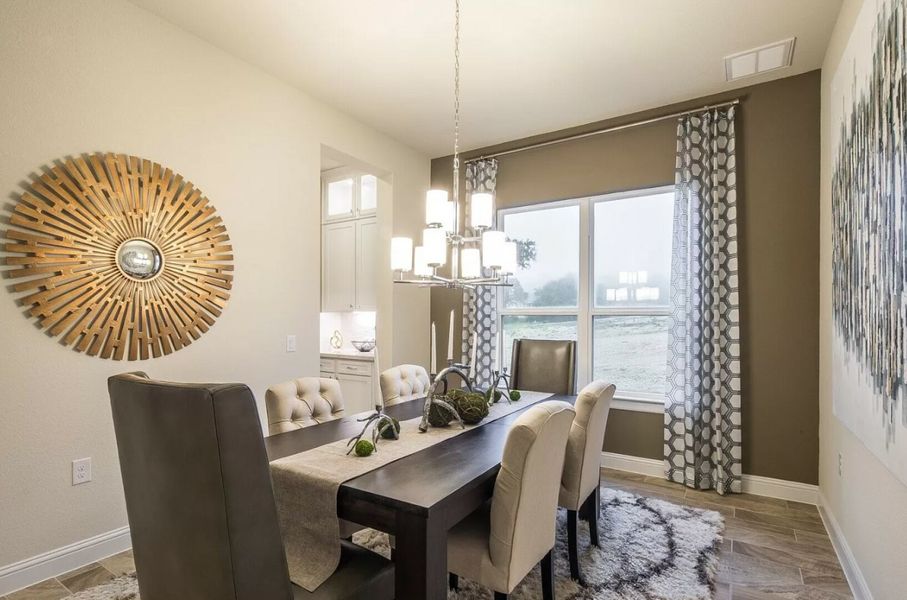 Furnished interior in a model home at Double Eagle Ranch in Cedar Creek (Image 18).