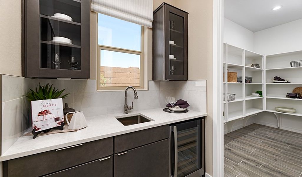 Furnished interior in a model home at Saguaro Reserve III in Marana (Image 30).