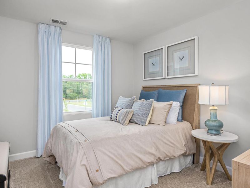 Furnished interior in a model home at Springvale in Willow Spring (Image 14).