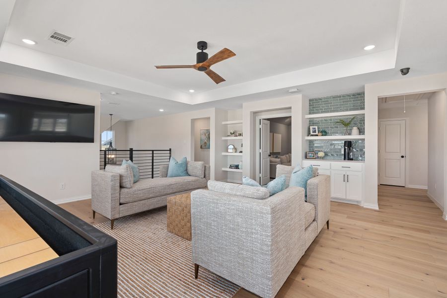 Furnished interior in a model home at Sweetgrass 50s in Haslet (Image 28).