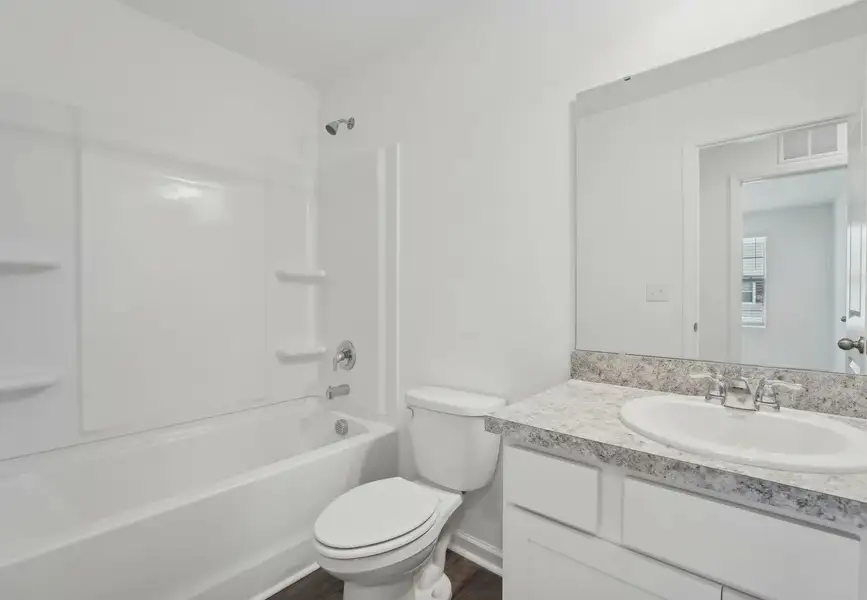 Furnished interior in a model home at Clinton Townhomes in Dade City (Image 10).