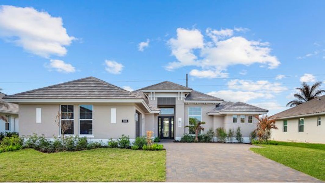 Front exterior of a home in the Bent Pine Preserve community, located in Vero Beach, FL (Image 5).