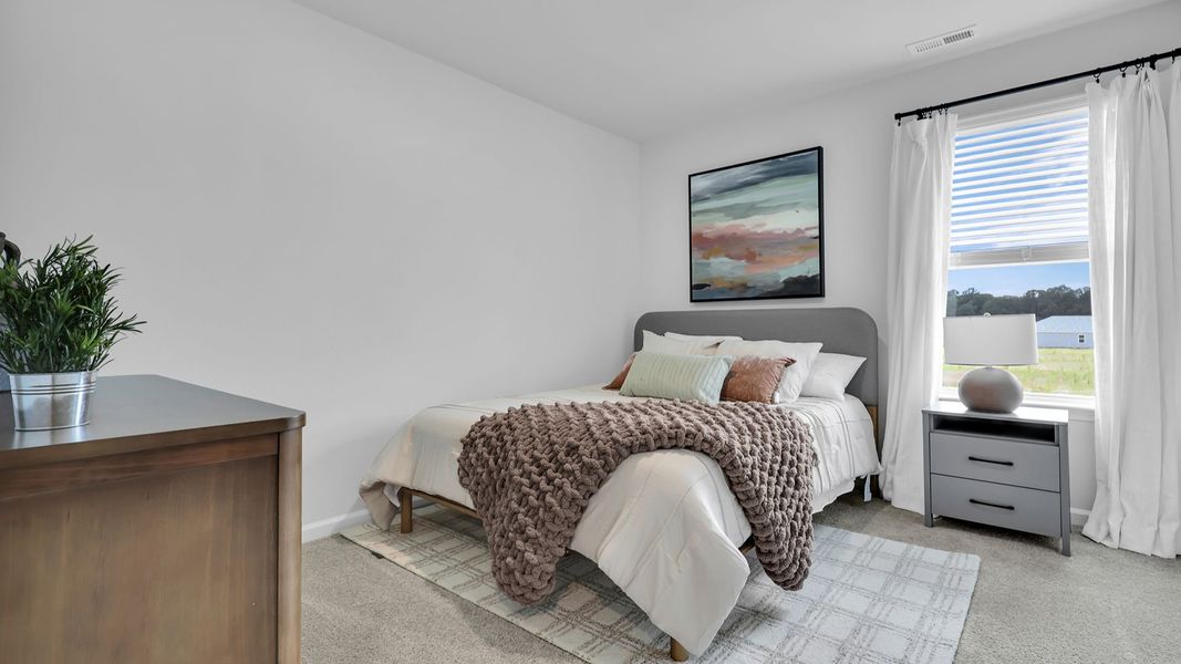 Furnished interior in a model home at The Ranch in Holly Hill (Image 26).