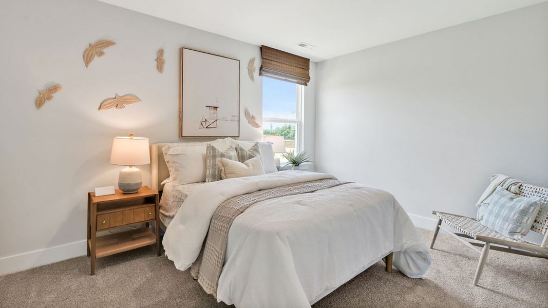 Furnished interior in a model home at Saltgrass Landing in Winnabow (Image 28).