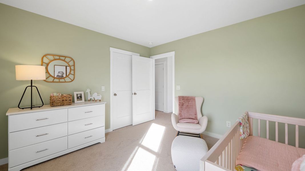 Furnished interior in a model home at Evergreen Landing in Rossville (Image 21).