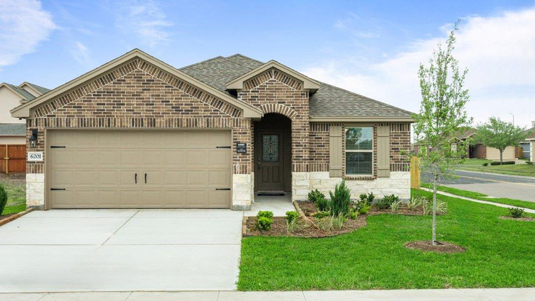 Front exterior of a home in the Bridges Mill community, located in Corpus Christi, TX (Image 1).