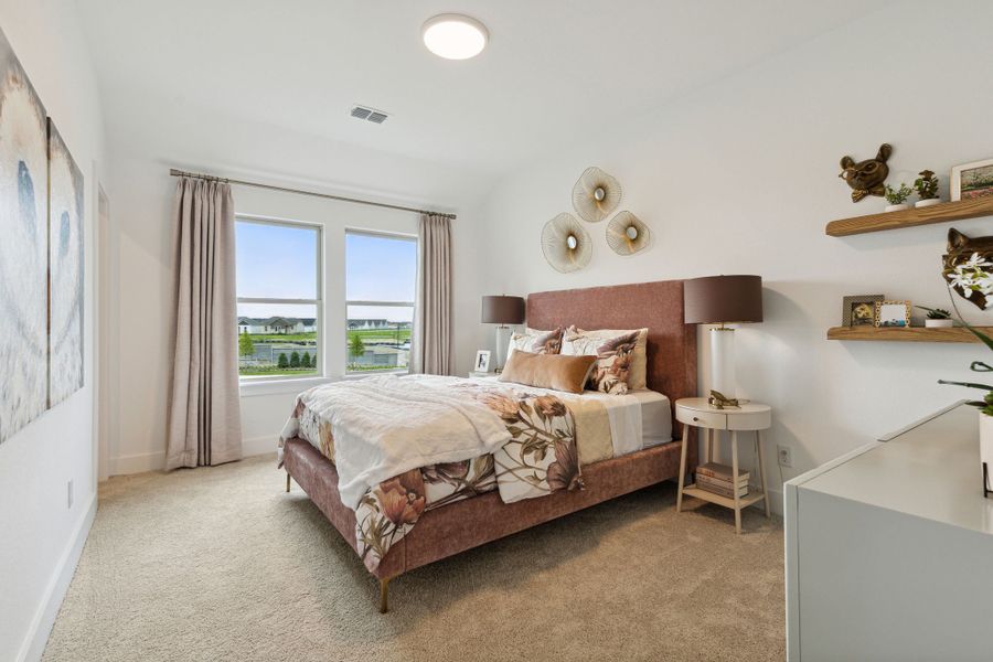 Furnished interior in a model home at Painted Tree Lakeside in McKinney (Image 34).
