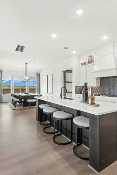 Furnished interior in a model home at East View Farms in Georgetown (Image 9).