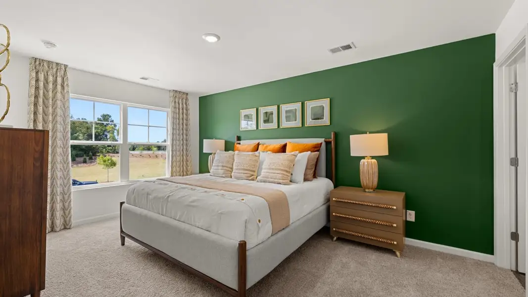 Furnished interior in a model home at The Gables at Agricultural Village in Perry (Image 9).